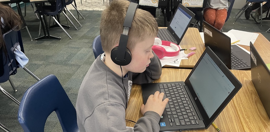 Student Using Headphones