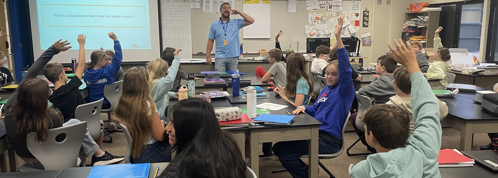 Teacher Conducting A Survey