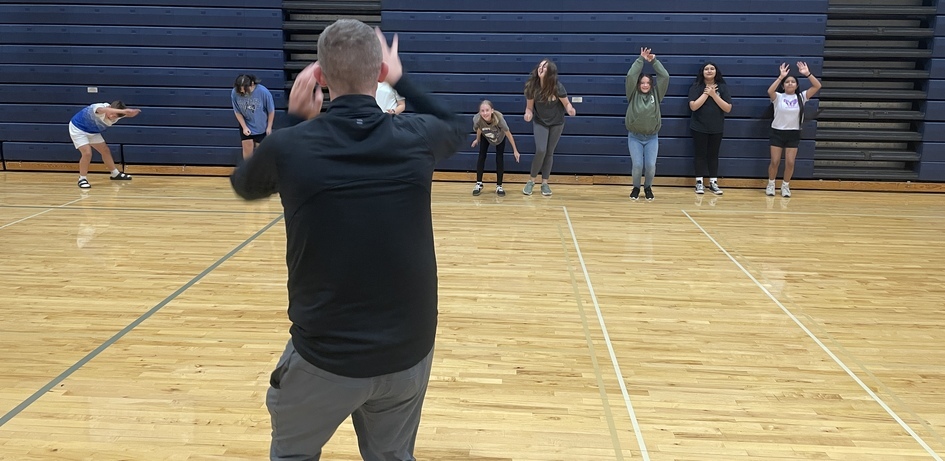 Teacher Demonstrating Exercise