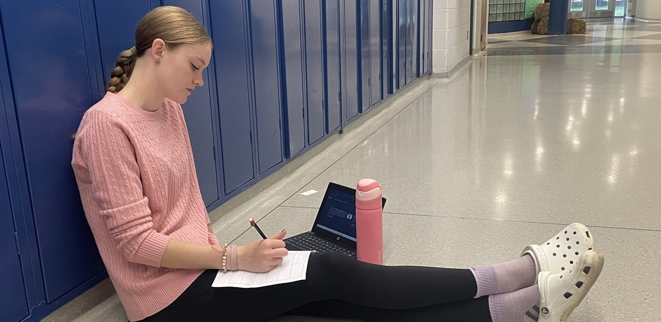 Student Working in Hallway