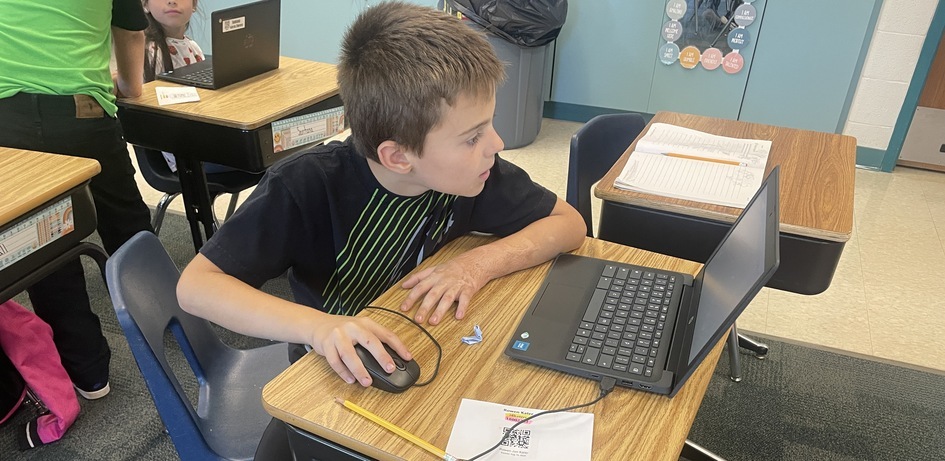 Student Using A Computer Mouse