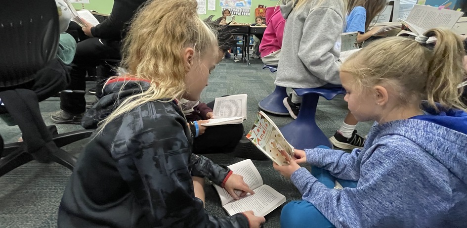 Students Reading To Each Other