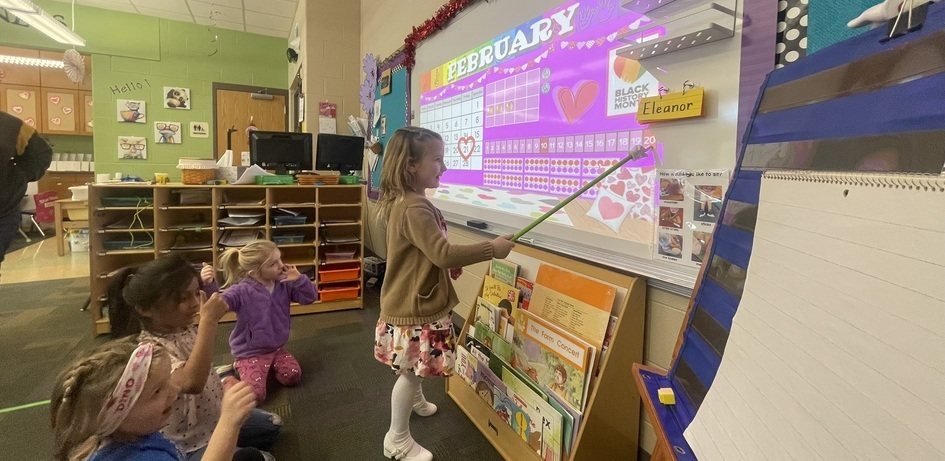Student Pointing to Screen