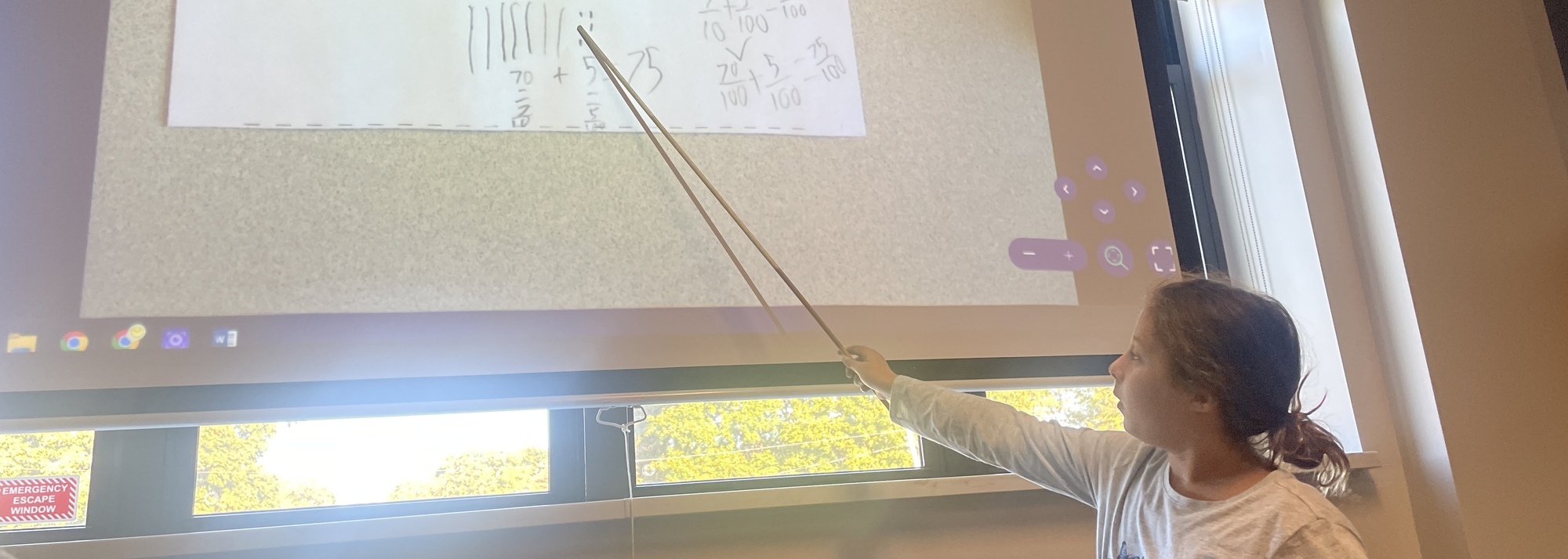 Student Using Pointer Toward Screen