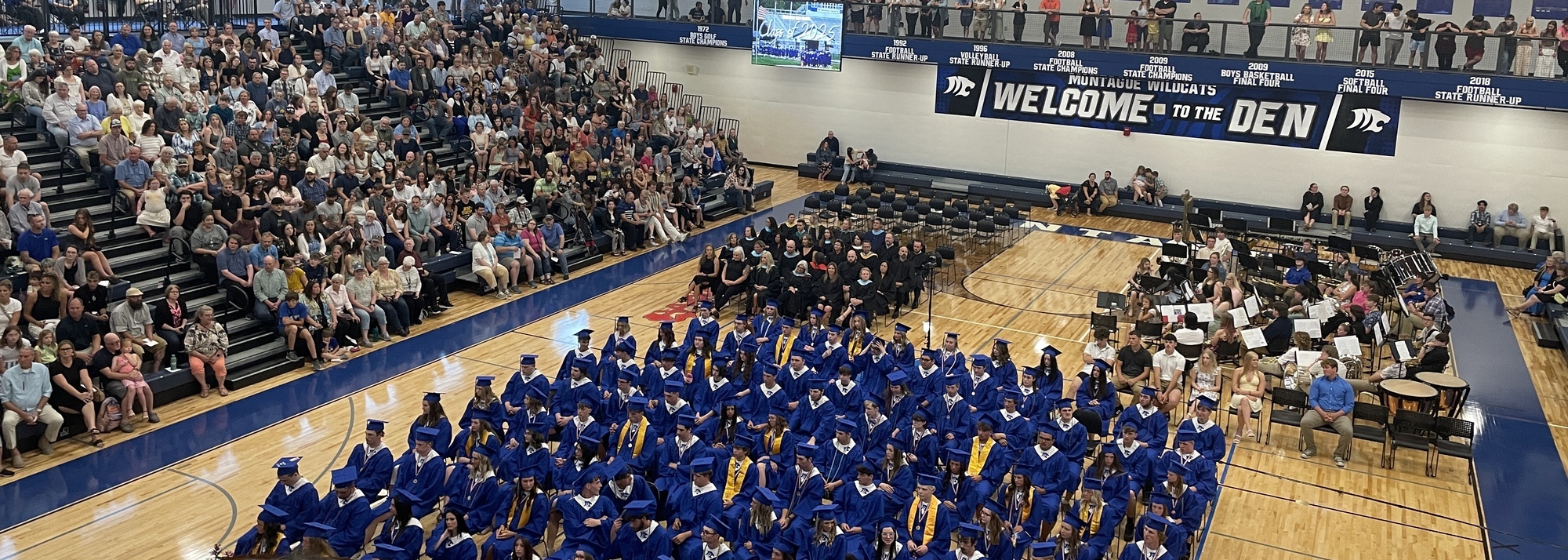 Graduates Sitting Together
